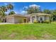 Charming home with a well-maintained lawn and inviting curb appeal in a desirable neighborhood at 4357 Mermell Cir, North Port, FL 34291