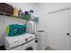 Functional laundry room with shelving and modern washer and dryer at 4357 Mermell Cir, North Port, FL 34291
