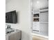 Organized walk-in closet with built-in shelving and drawers at 455 Cleveland Dr, Sarasota, FL 34236