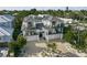 Stunning modern home with lush tropical landscaping and a grand driveway at 455 Cleveland Dr, Sarasota, FL 34236