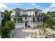 Beautiful modern home with a rooftop deck and multiple balconies at 455 Cleveland Dr, Sarasota, FL 34236