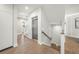 Hallway with an elevator and wooden steps at 455 Cleveland Dr, Sarasota, FL 34236