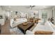 Open concept living room with modern design elements, natural light, and inviting seating arrangement at 455 Cleveland Dr, Sarasota, FL 34236