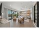 Inviting main bedroom with a large window, stylish decor, and comfortable seating area at 455 Cleveland Dr, Sarasota, FL 34236