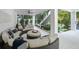 Open patio with comfortable seating and lush landscaping at 455 Cleveland Dr, Sarasota, FL 34236