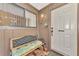 Inviting front entry featuring a bench and decor at 495 Oak Hill Cir # 44, Sarasota, FL 34232