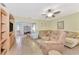 Relaxing living room with a recliner, comfortable couch, and views of adjacent living spaces at 495 Oak Hill Cir # 44, Sarasota, FL 34232