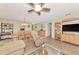 Bright living space with views to the dining area, and a built-in entertainment center at 495 Oak Hill Cir # 44, Sarasota, FL 34232