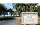 Glenn Lakes Park sign amidst lush greenery, highlighting exclusive community access and a welcoming park at 5078 47Th W St, Bradenton, FL 34210