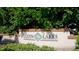Welcoming entrance to Glenn Lakes community, surrounded by lush greenery and a decorative sign at 5078 47Th W St, Bradenton, FL 34210
