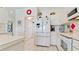 Eat-in kitchen features tile floor and white cabinetry at 5078 47Th W St, Bradenton, FL 34210