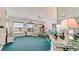 Bright living room featuring large windows offering views of the outdoor scenery at 5078 47Th W St, Bradenton, FL 34210