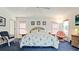 Spacious main bedroom with coastal decor, wicker furniture, and ample natural light for a comfortable ambiance at 5078 47Th W St, Bradenton, FL 34210