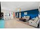 Open-concept living room features tile floors, recessed lighting, and neutral walls at 5301 Shell Mound Cir, Punta Gorda, FL 33982