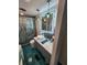 Beautiful bathroom featuring a vessel sink, modern vanity, and enclosed glass shower at 5402 Chateau Ln, Bradenton, FL 34207
