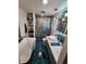 Beautiful bathroom with a modern bathtub, shower and large vessel sink at 5402 Chateau Ln, Bradenton, FL 34207