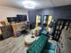 Elegant bedroom/office combo featuring contemporary design, accent wall, and functional furnishings at 5402 Chateau Ln, Bradenton, FL 34207