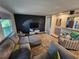 Comfortable living room features modern decor, a sectional sofa, and an entertainment area at 5402 Chateau Ln, Bradenton, FL 34207
