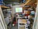 Organized storage space featuring tools, supplies, and cleaning equipment for convenient access at 5402 Chateau Ln, Bradenton, FL 34207
