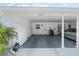 Attached carport with space for vehicles, providing convenient and covered parking at 6016 Hibiscus Dr, Bradenton, FL 34207