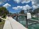 This private boat lift allows for convenient access to boating and water activities on the canal at 624 Mourning Dove Dr, Sarasota, FL 34236
