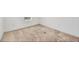 Bedroom with neutral-toned carpet flooring at 6454 Baytown Dr, Sarasota, FL 34240