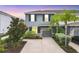 Charming two-story home with well-manicured landscaping and inviting curb appeal at 6454 Baytown Dr, Sarasota, FL 34240