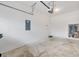 The garage features painted walls, concrete flooring and a utility sink at 6454 Baytown Dr, Sarasota, FL 34240