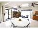 Bright clubhouse features a library, a round table with seating, and natural lighting at 6504 Heritage Ln # 99, Bradenton, FL 34209