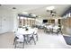 Spacious clubhouse boasts ample seating, natural light, and a small kitchenette at 6504 Heritage Ln # 99, Bradenton, FL 34209