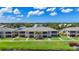 Aerial view of community buildings, landscaping, and water feature at 6604 7Th Avenue W Cir, Bradenton, FL 34209