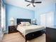 Lovely bedroom features neutral decor, a ceiling fan, and great natural light at 6604 7Th Avenue W Cir, Bradenton, FL 34209