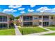 Exterior view of community buildings with well-maintained landscaping at 6604 7Th Avenue W Cir, Bradenton, FL 34209