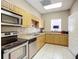 Clubhouse kitchen with stainless steel appliances and ample counter space at 6604 7Th Avenue W Cir, Bradenton, FL 34209
