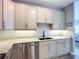 The kitchen features stainless steel appliances and granite countertops at 6604 7Th Avenue W Cir, Bradenton, FL 34209