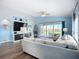 Spacious living room boasts lots of natural light and a view of the water at 6604 7Th Avenue W Cir, Bradenton, FL 34209