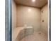 Tiled shower stall with a built-in bench at 6604 7Th Avenue W Cir, Bradenton, FL 34209