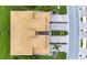 Bird's-eye view of the house showing the roof, driveway, and surrounding landscape and street at 6918 Grand Estuary Trl # 104, Bradenton, FL 34212