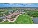 Beautiful aerial view of the community, golf course and clubhouse at 6918 Grand Estuary Trl # 104, Bradenton, FL 34212