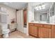 Charming bathroom with a shower-tub combo and a vanity with storage at 6918 Grand Estuary Trl # 104, Bradenton, FL 34212