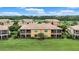 Beautiful community of townhomes overlooking the golf course and lake at 6918 Grand Estuary Trl # 104, Bradenton, FL 34212