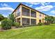 Charming condo boasts a screened lanai perfect for enjoying the outdoors at 6918 Grand Estuary Trl # 104, Bradenton, FL 34212