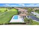 Beautiful community pool, cabana, and manicured lawns create a resort-style ambiance at 6918 Grand Estuary Trl # 104, Bradenton, FL 34212