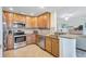 Well-equipped kitchen with stainless steel appliances, granite countertops, and ample cabinet space at 6918 Grand Estuary Trl # 104, Bradenton, FL 34212
