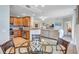 Bright living space with a modern kitchen, cozy dining area, and a view of the living room at 6918 Grand Estuary Trl # 104, Bradenton, FL 34212