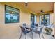 Outdoor patio with comfortable seating and scenic views, perfect for entertaining at 6918 Grand Estuary Trl # 104, Bradenton, FL 34212