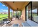Relaxing screened-in patio with comfortable seating and scenic views at 6918 Grand Estuary Trl # 104, Bradenton, FL 34212