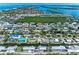Spacious waterfront community offers beautiful scenery and a serene atmosphere perfect for relaxation and recreation at 726 Jungle Queen Way, Longboat Key, FL 34228
