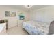 Cozy bedroom with natural light, ceiling fan, closet and white dresser at 726 Jungle Queen Way, Longboat Key, FL 34228