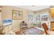 Bright breakfast nook with a large window offering natural light and views of the outdoors at 7674 Fairway Woods Dr # 1605, Sarasota, FL 34238